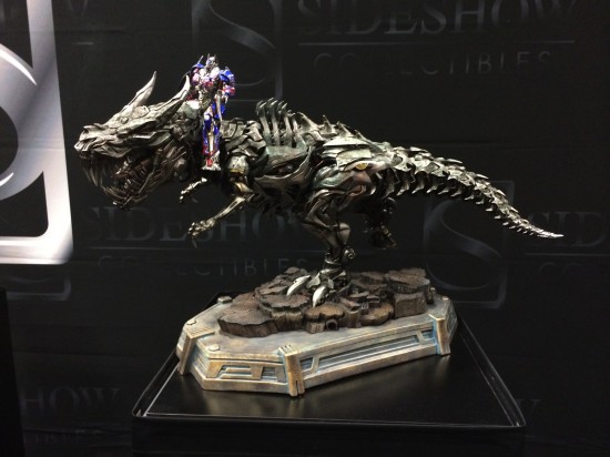 HUGE Optimus Prime on Grimlock Transformers: Age of Extinction statue previews on display at Sideshow Collectibles
