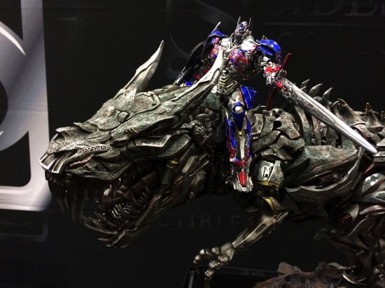 HUGE Optimus Prime on Grimlock Transformers: Age of Extinction statue previews on display at Sideshow Collectibles