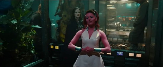Ophelia Lovibond plays The Collector's pink-ish colored alien assistant