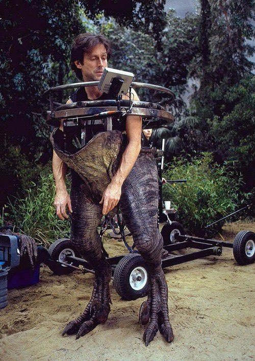 effects artist John Rosengrant working in a raptor half-suit for Jurassic Park III.