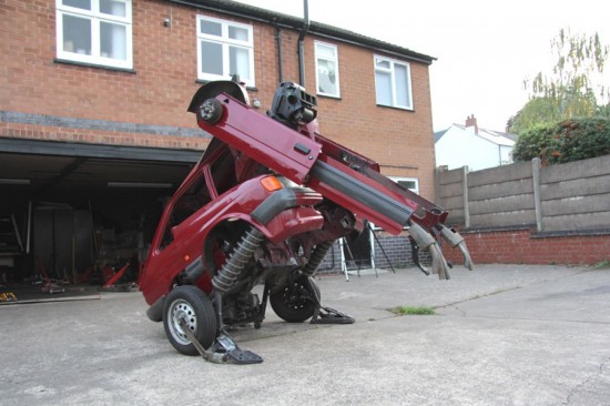 Artist Turns 1988 Ford Fiesta Into Sculpture of a Squatting Transformer