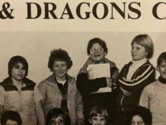 Patton Oswalt holding the PLAYER'S MANUAL, in his 6th grade D&D club photo