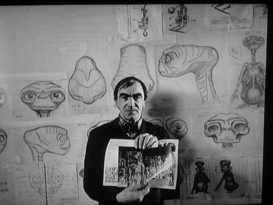 CARLO RAMBALDI with the designs of his creation E.T.